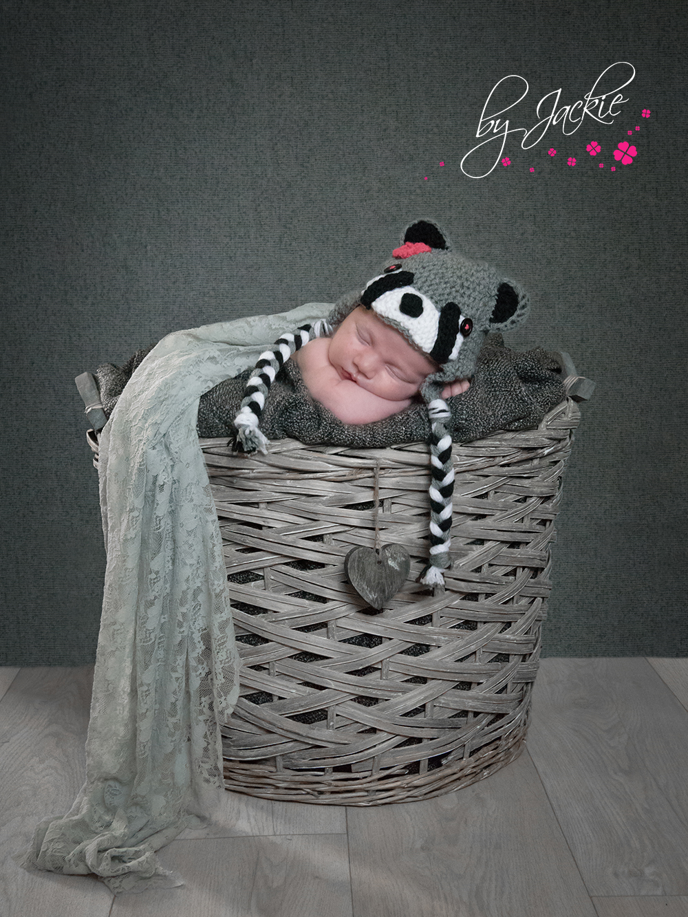 Newborn baby in basket prop with raccoon hat Babies By Jackie Yorkshire UK