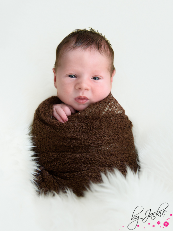 IMage of newborn baby boy in potato sack pose in north yorkshire Credit Babies By Jackie from Hemingbrough near York