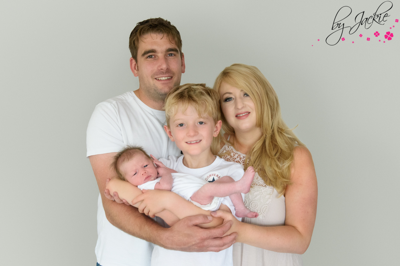 Contemporary family portrait with newborn baby girl By Jackie Photography North Yorkshire