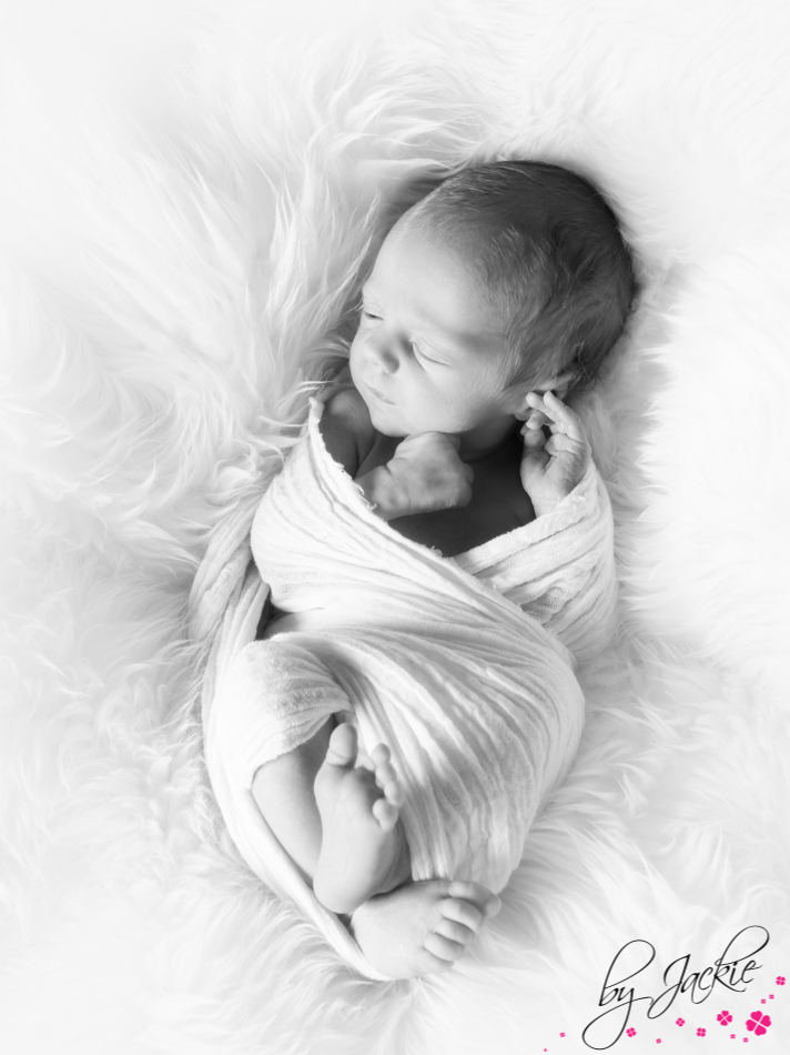 Newborn baby boy wrapped and awake. Babies By Jackie near Howden and York