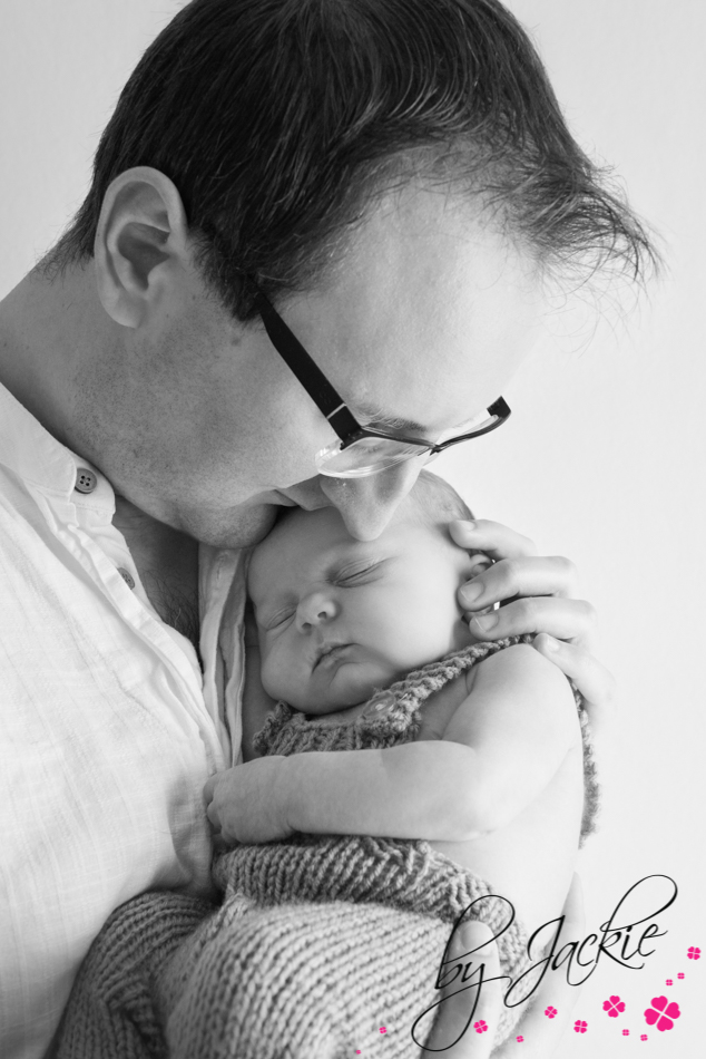Photo of dad with his newborn baby boy by Babies By Jackie, near York, Howden and Selby, Yorkshire UK