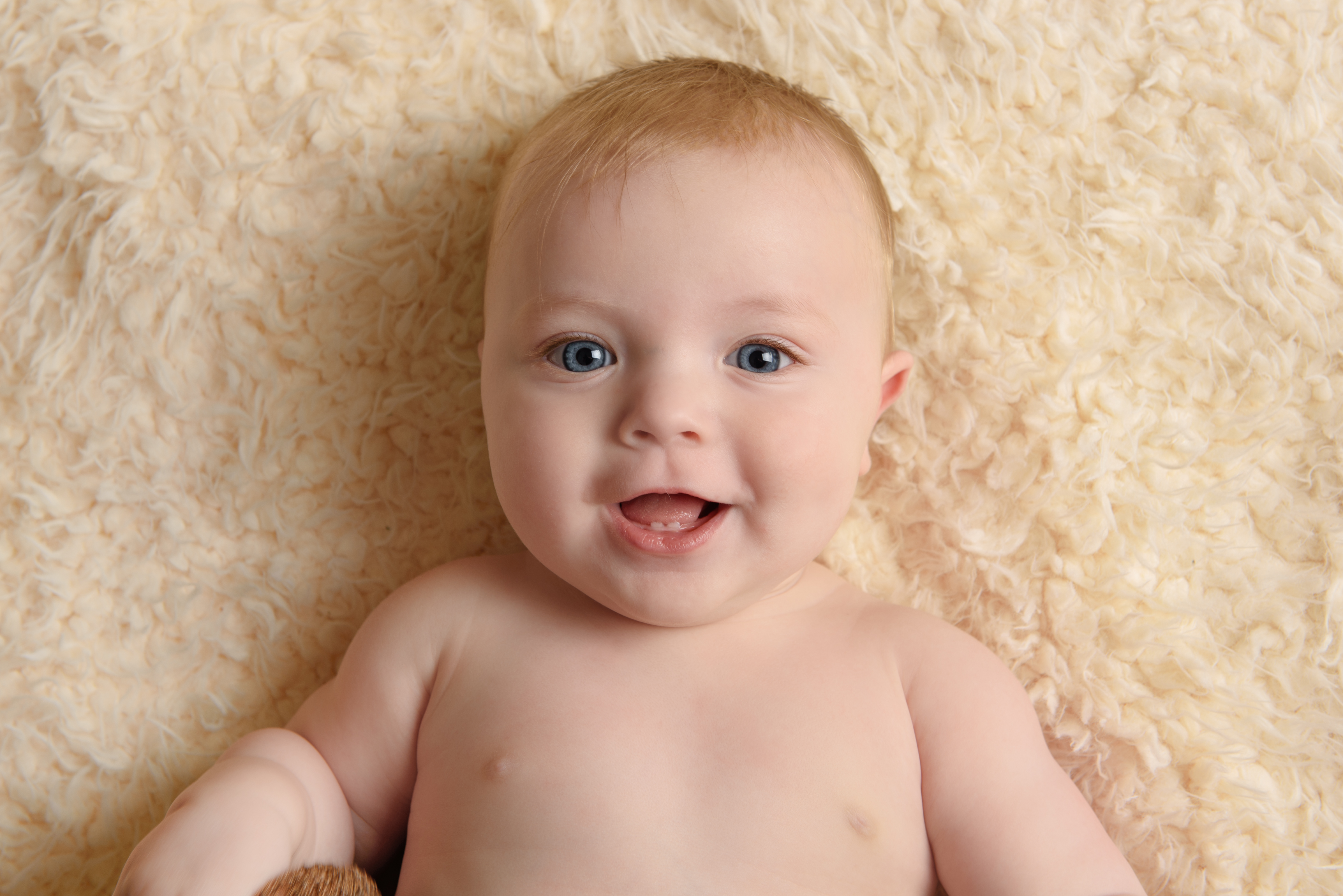 six month old baby facial expressions by Babies By Jackie in Market Weighton near York