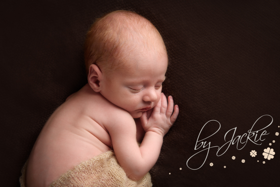 Image of newborn baby boy and his gorgeous little wrinkles by Babies By Jackie - specialist photographer in Market Weighton, near York, Yorkshire, UK